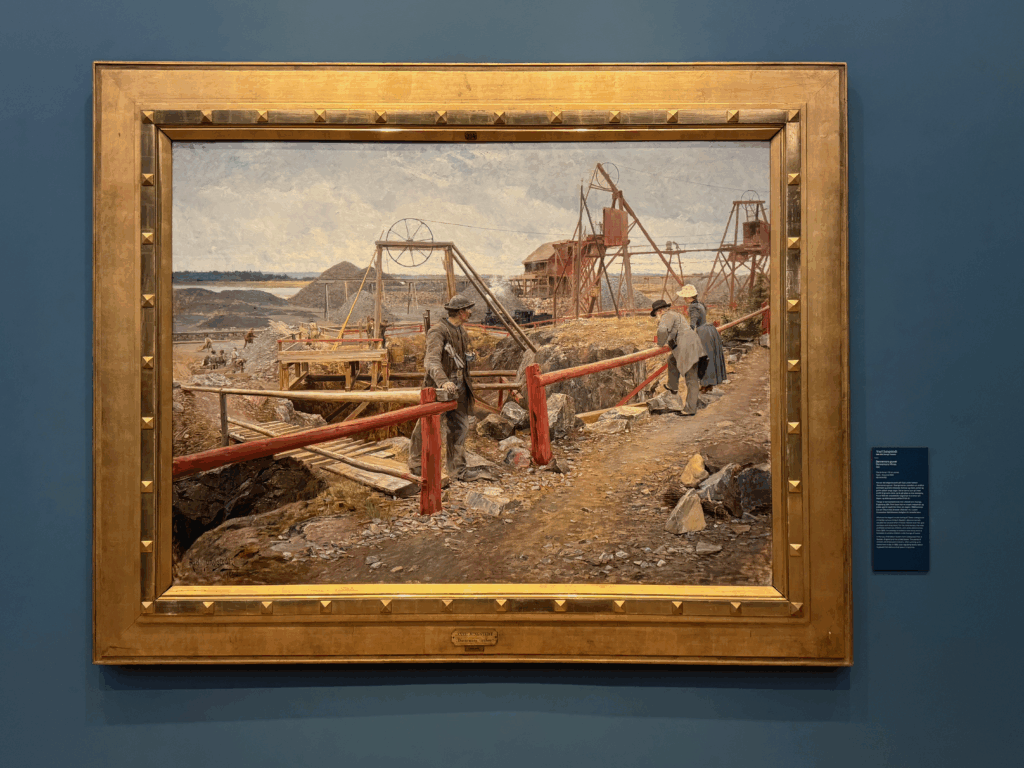 ノルウェー国立美術館に展示されているアクセル・エンドレクセン作《鉱山の風景》。採掘現場と働く人々を描いたリアルな産業画。